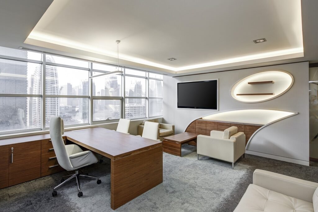 Office desk beside a window